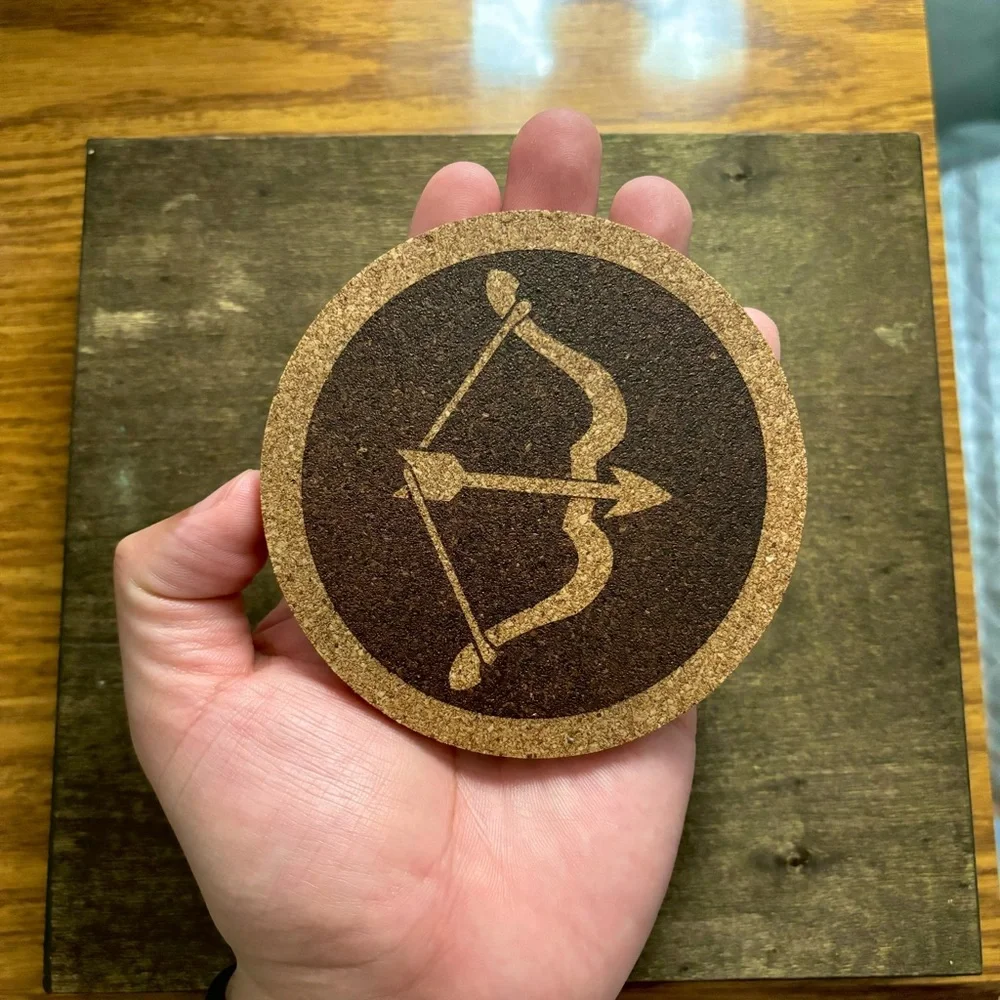 Hawkeye Symbol Laser Engraved Cork Coaster